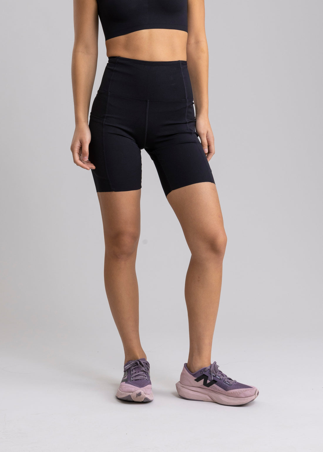 Legging Running Unfinished Rhea Black con 7 Bolsillos