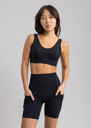 Legging Running Unfinished Rhea Black con 7 Bolsillos
